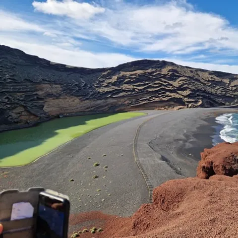 El Golfo's green lagoon and black sand beach on Lanzarote's west coast